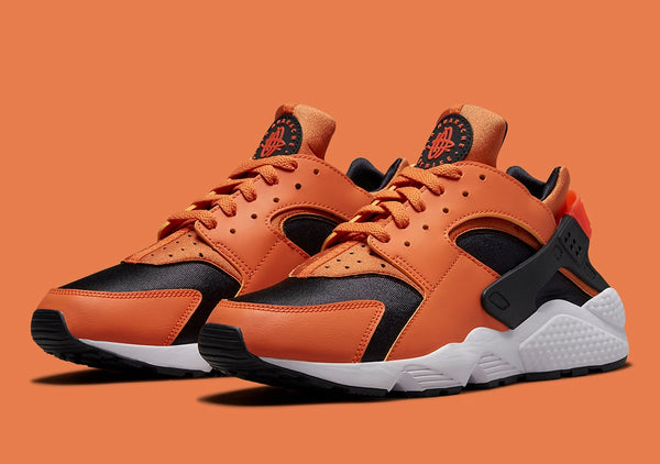 Nike air huarache zebra sales dark loden laser orange